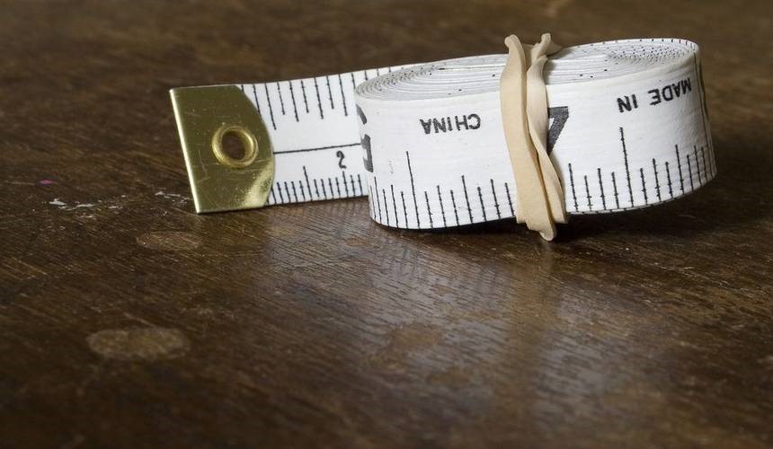 7. Tame the wily measuring tape rubber bands