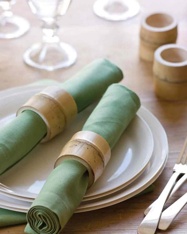 6. An elegant dinner table setting featuring BAMBOO NAPKIN RINGS